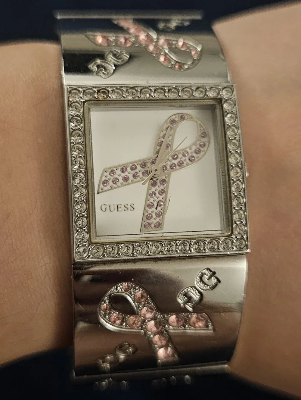 GUESS Women's Silver Tone Pink Ribbon Crystal Bracelet Watch